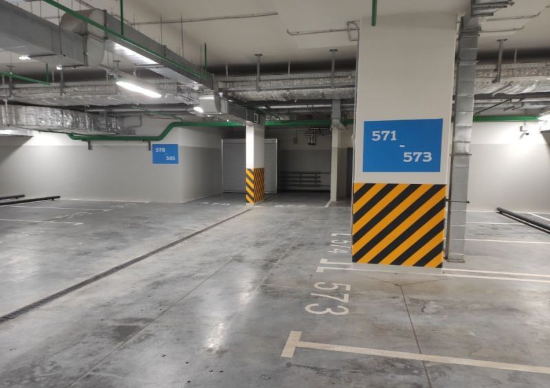 Подземная парковка. Керамогранит в подземном паркинге. ЖК среда паркинг. Ракушка на подземном паркинге.